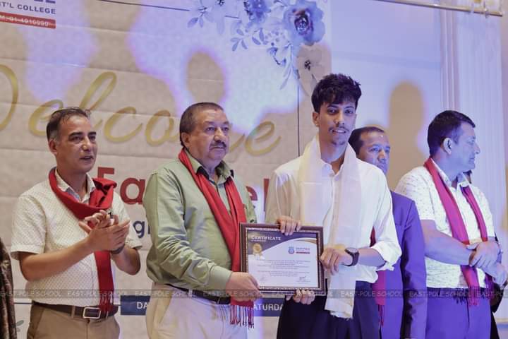 Me receiving my Student of the Year award